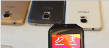 Galaxy Gear 2 s neznámými telefony na pozadí