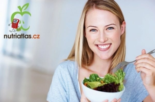 healthy woman eating salad