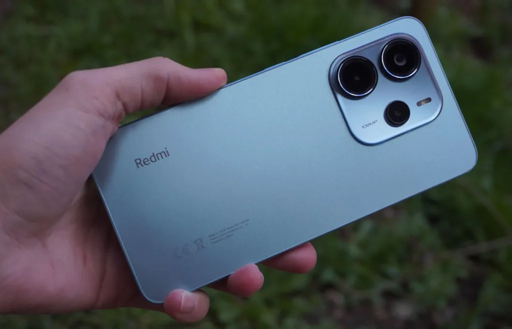 xiaomi redmi note 14 modra zada v ruce