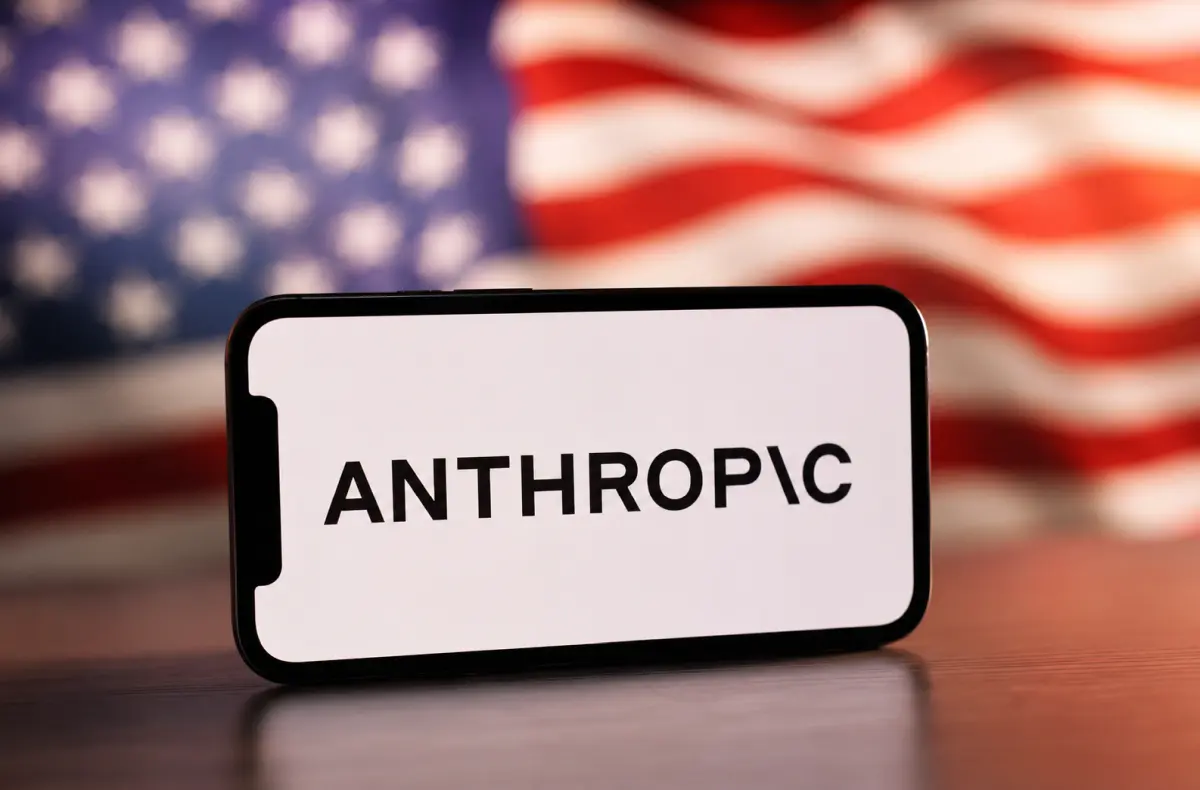 logo anthropic na mobilu s vlajkou USA v pozadi ai ilustrace